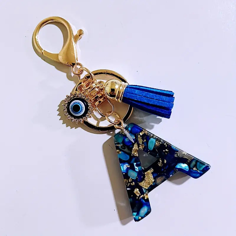 Wholesale Blue English letter Evil Eye tassel keychain