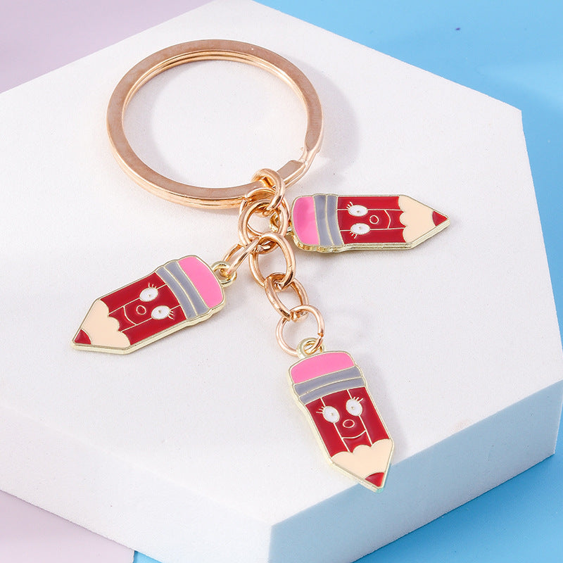 Wholesale Cartoon Crayon Pencil Zinc Alloy Keychain