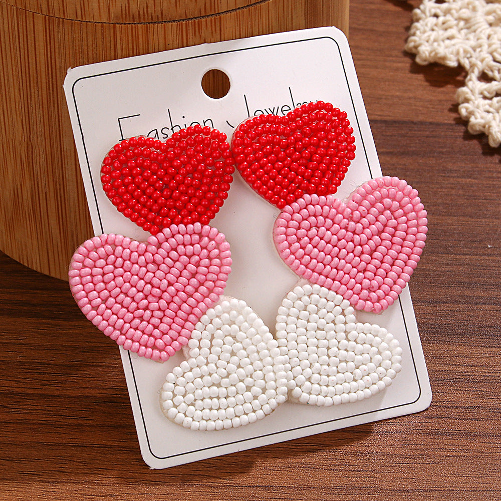 Wholesale  fashion temperament handmade three heart rice beads irregular earrings earrings Valentine's Day