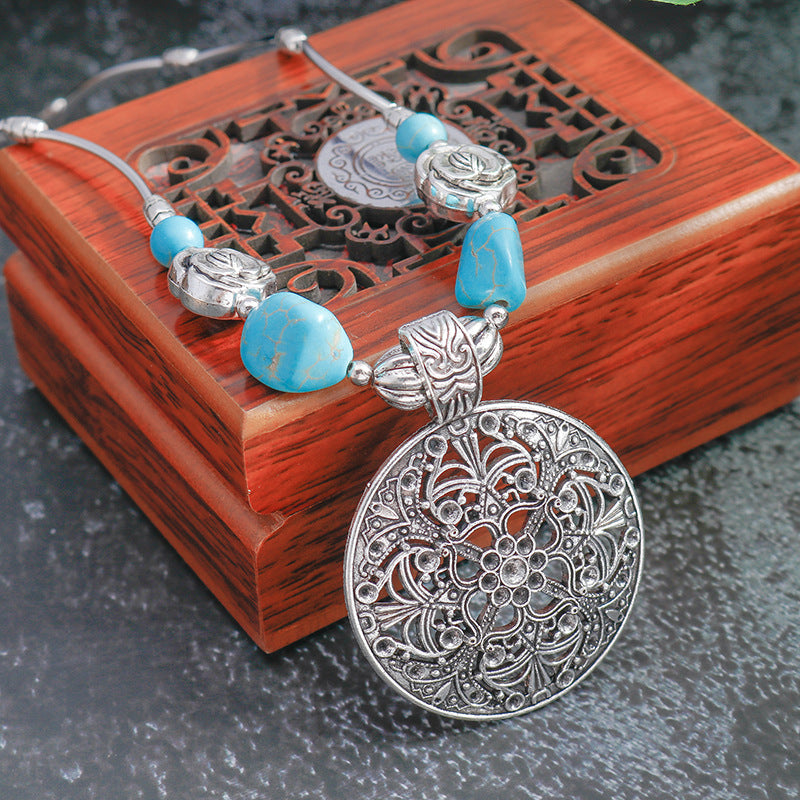 Wholesale Vintage silver hollowed out carved turquoise pendant necklace