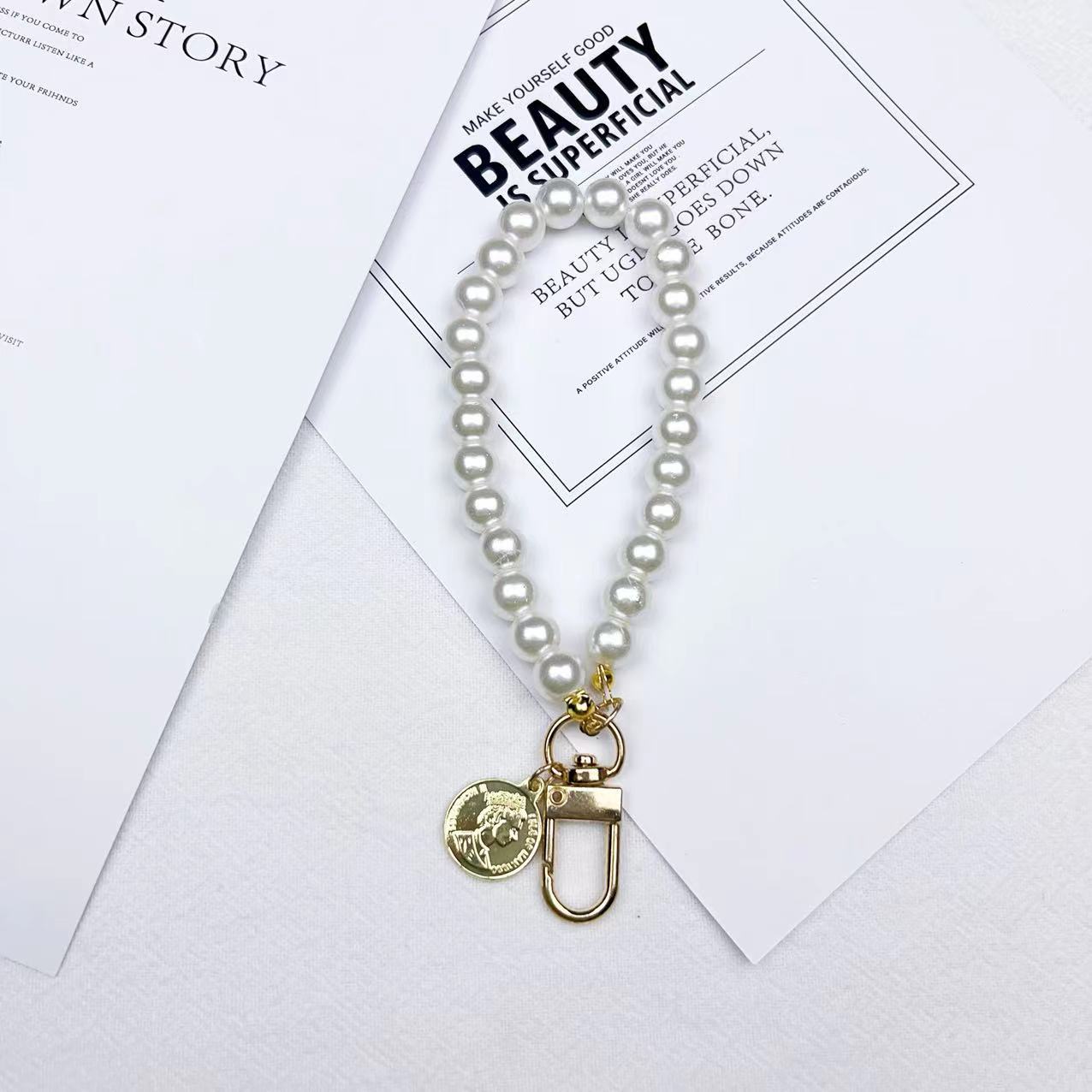 Wholesale Beauty Head Pearl Keychains