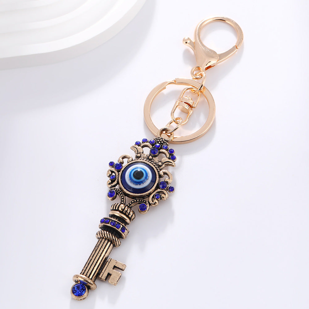 Wholesale Devil' s Eye Key Shape with Water Diamond Metal Keychain