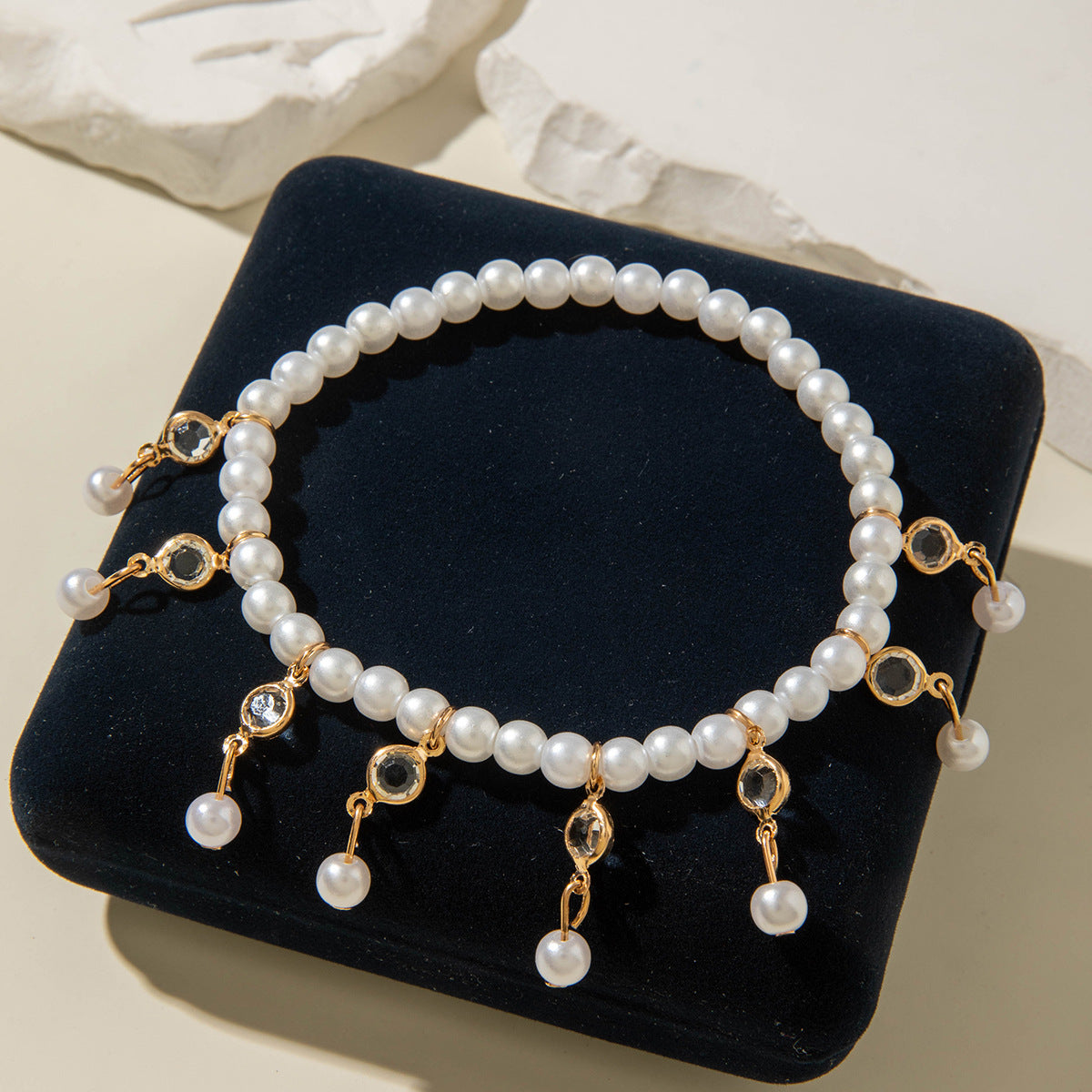 Two pieces of hand-woven anklets from shells