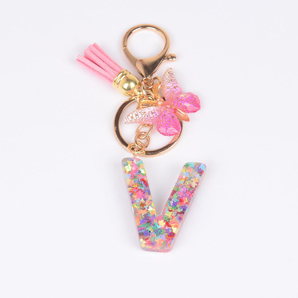卸売スパンコール英語蝶タッセル文字樹脂キーホルダー