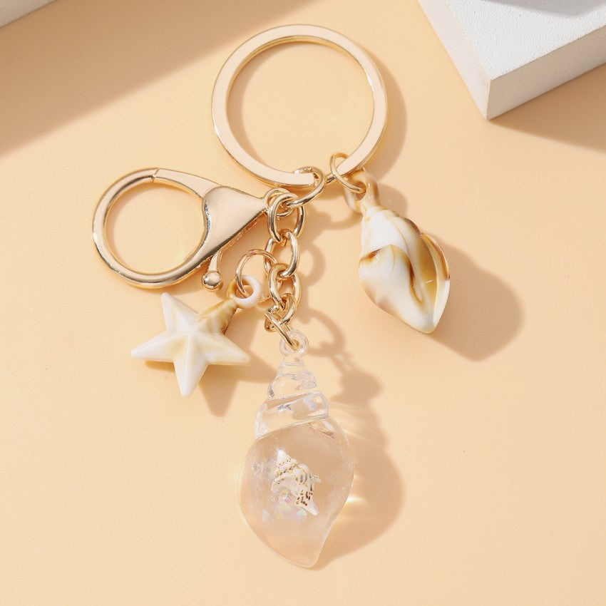 Wholesale Seaside vacation luminous conch Acrylic keychain