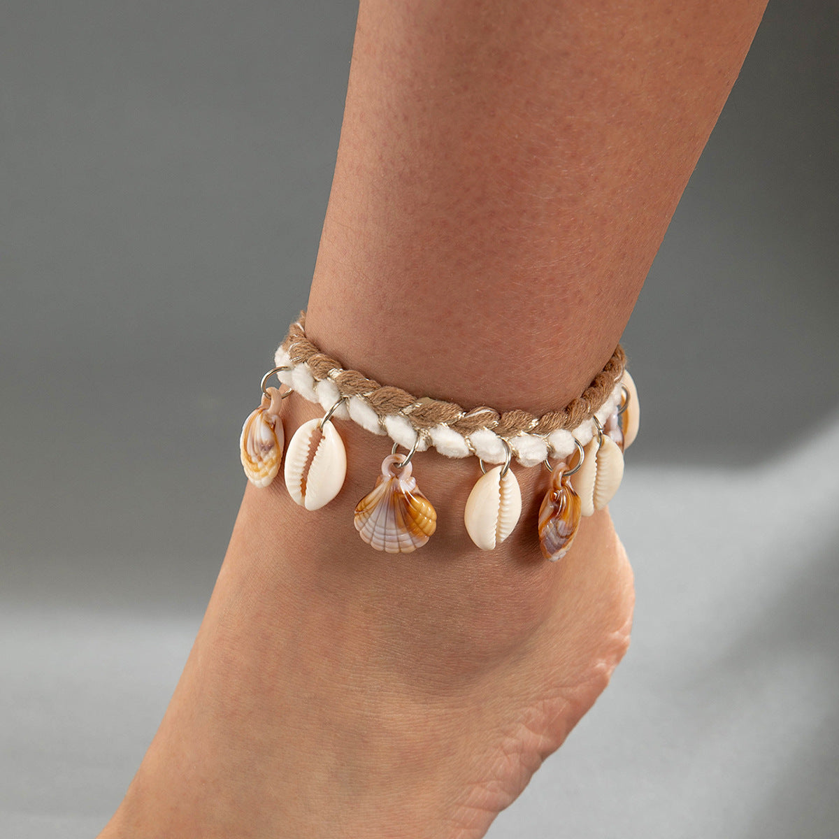 Two pieces of hand-woven anklets from shells