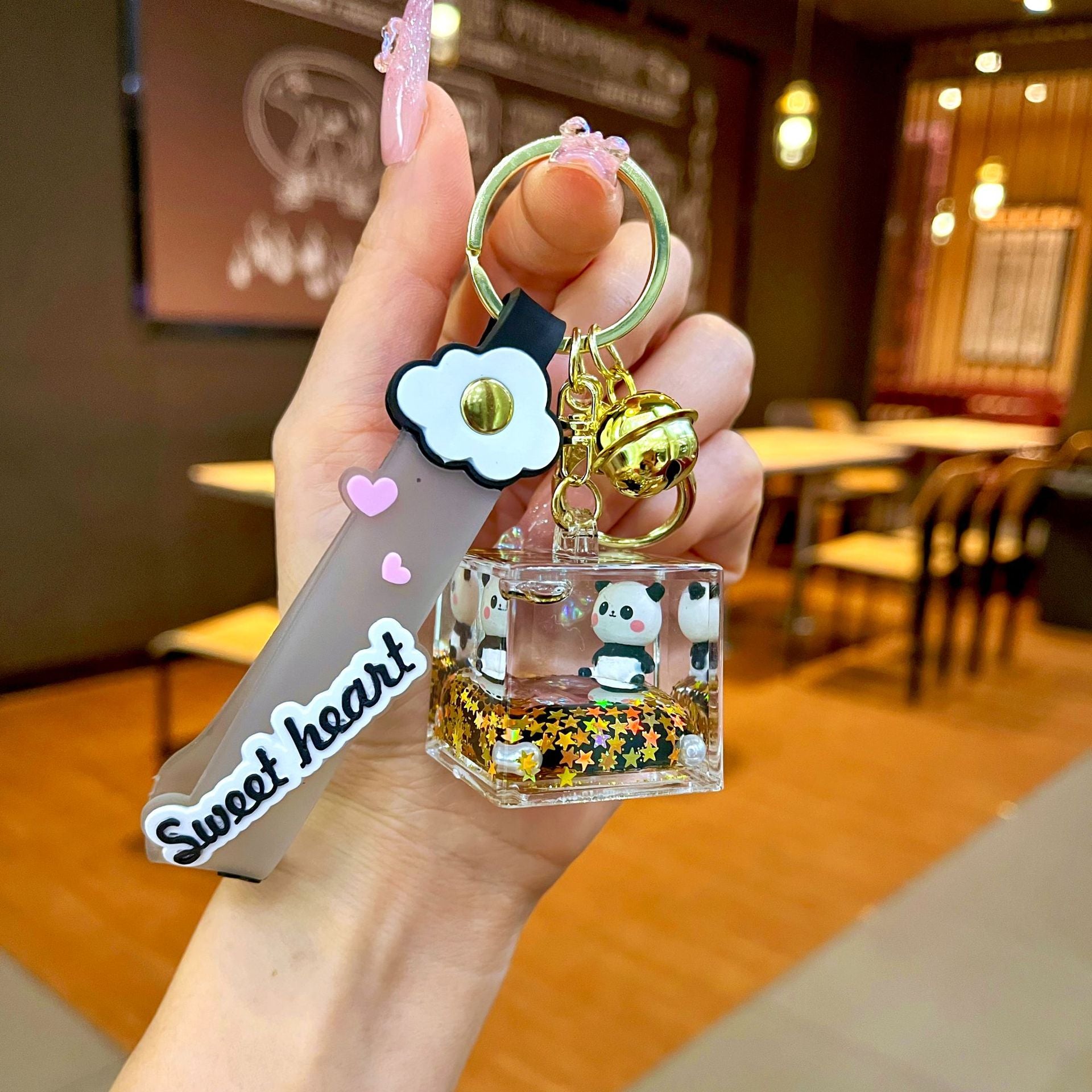 Wholesale Black gold floating cartoon cute panda Liquid Keychains