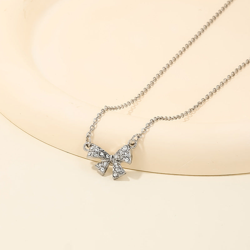 Wholesale sweet metal diamond bow necklace