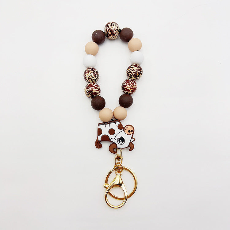 Wholesale Silicone Pumpkin Cow Ghost Dog Paw Wooden Bead Bracelet Keychain