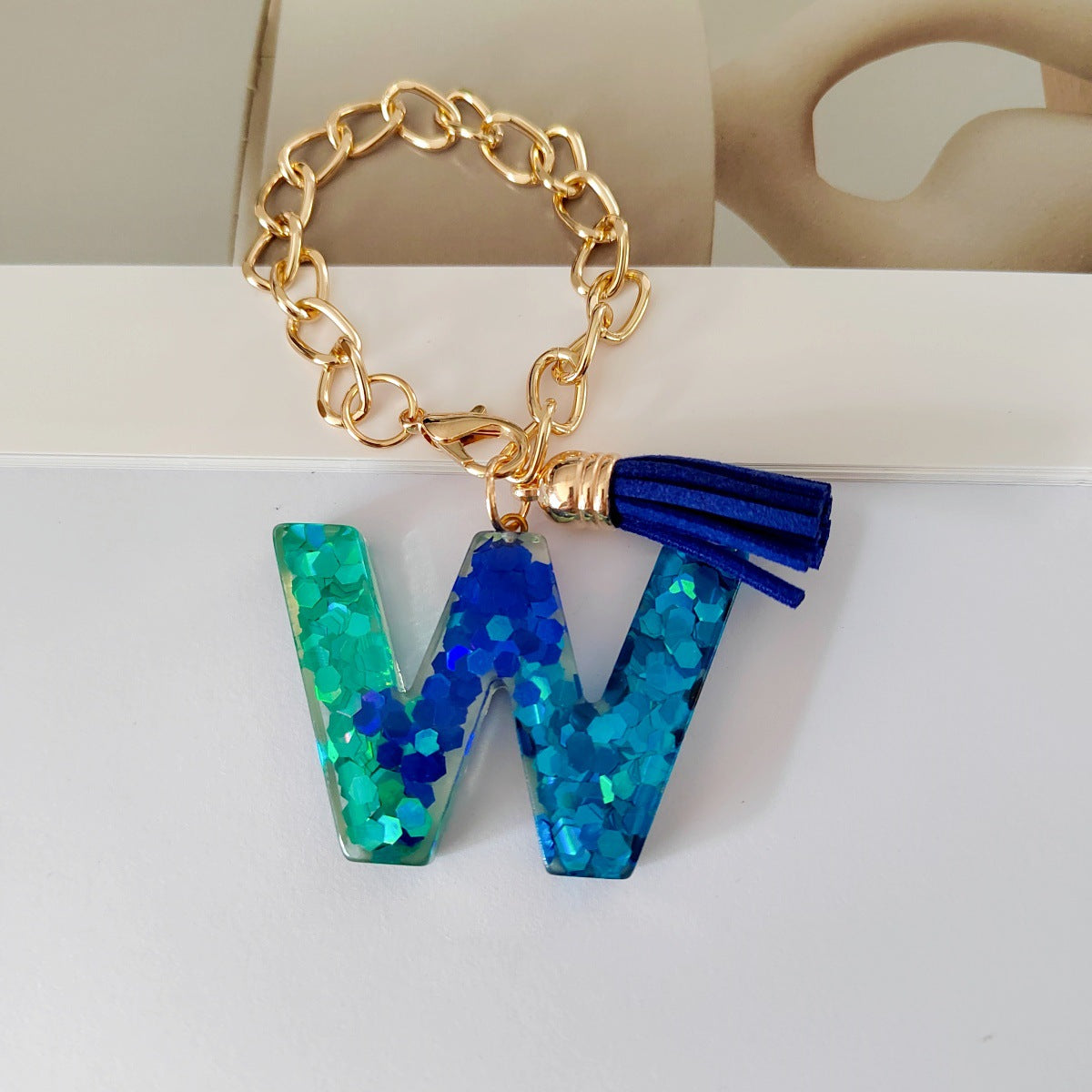 Wholesale Mixed color blue English letter keychain