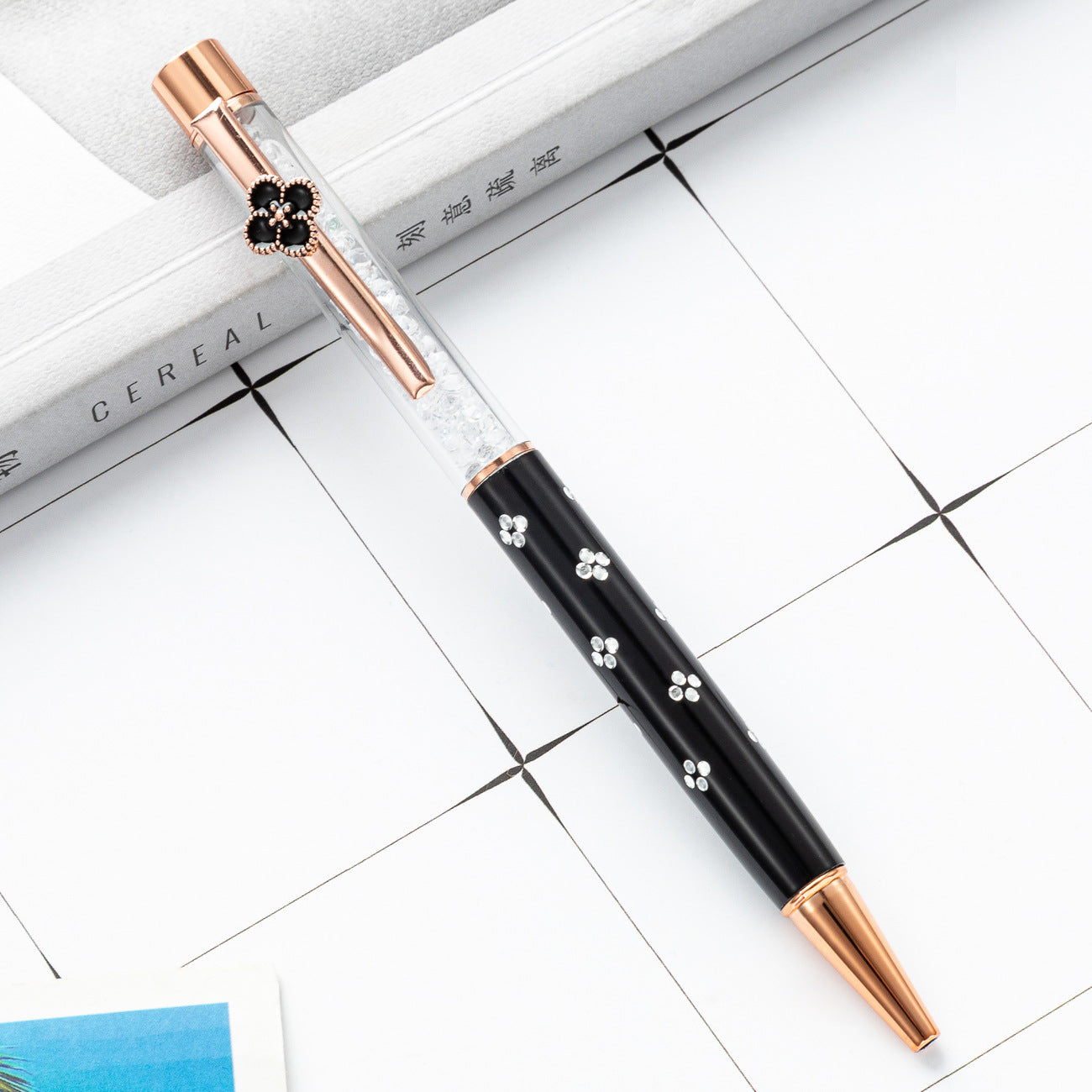 Bolígrafo de cristal de trébol de metal al por mayor