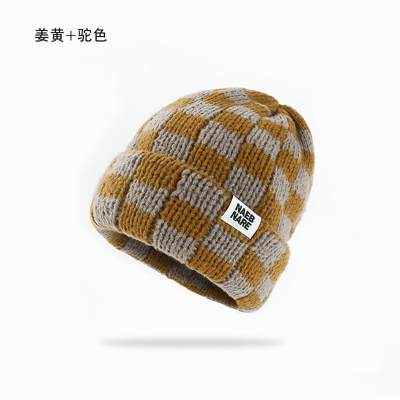 Wholesale Checkerboard plaid knitted hat women' s autumn and winter face-revealing small warm hat