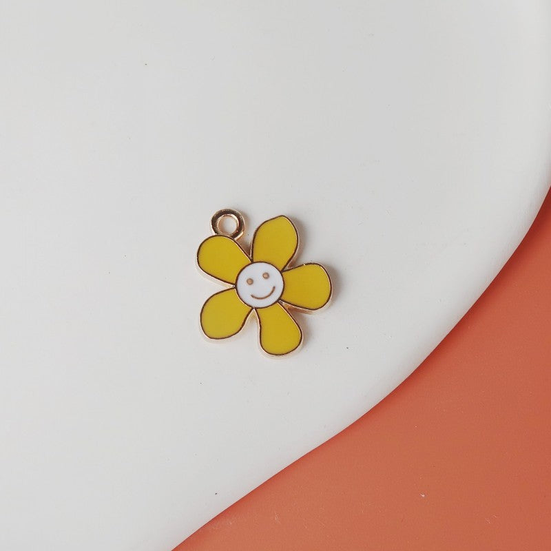 Wholesale smiley face flower oil drop alloy accessories Pendant