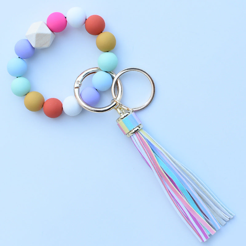 Wholesale Colorful leopard print silicone beaded bracelet keychain PU tassel pendant