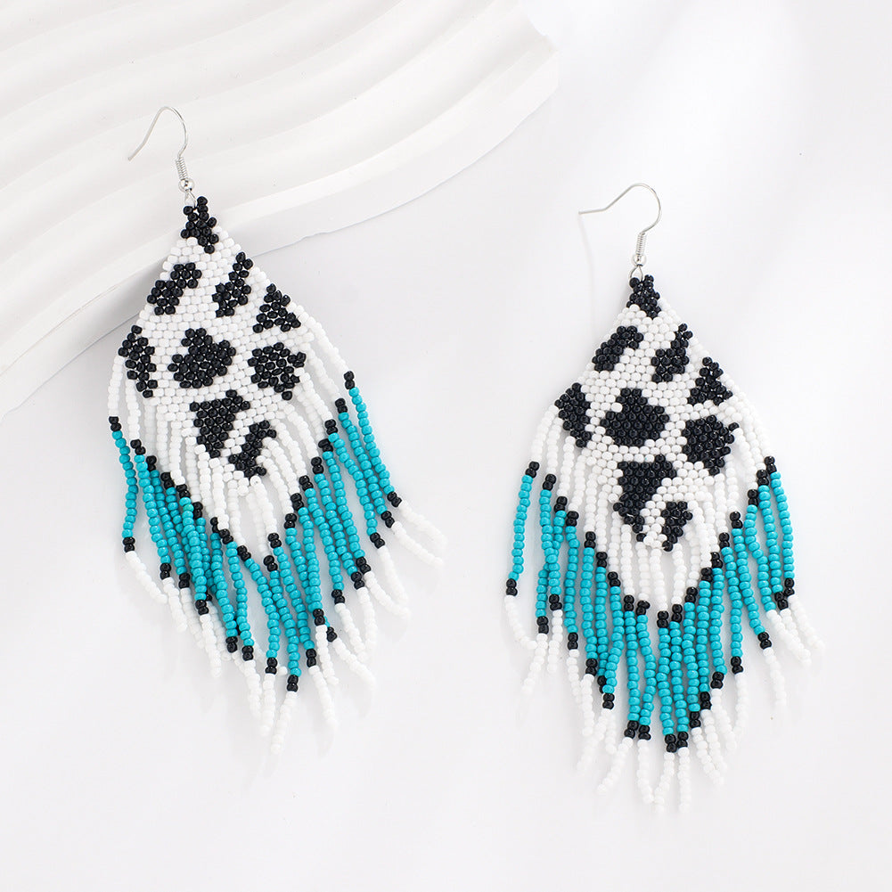 Wholesale Bohemian Handwoven Cow Pattern Long Tassel Rice Bead Earrings
