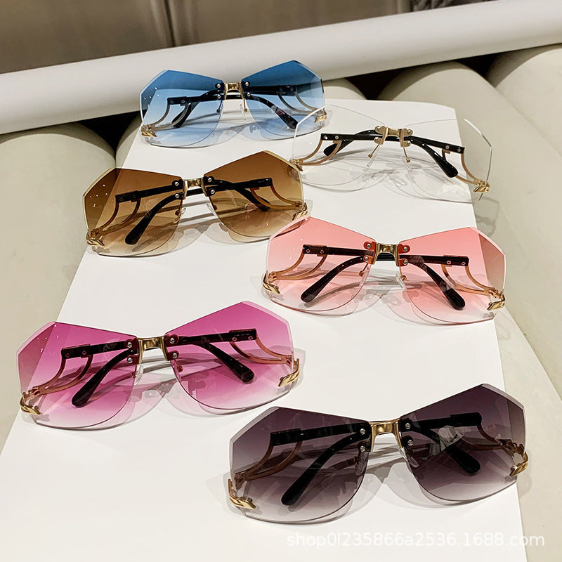 Wholesale  Arrival Frameless Sunglasses Women's Fashionable Personalized Trendy Hollow Glass Legs Irregular Ocean Piece Sunglasses