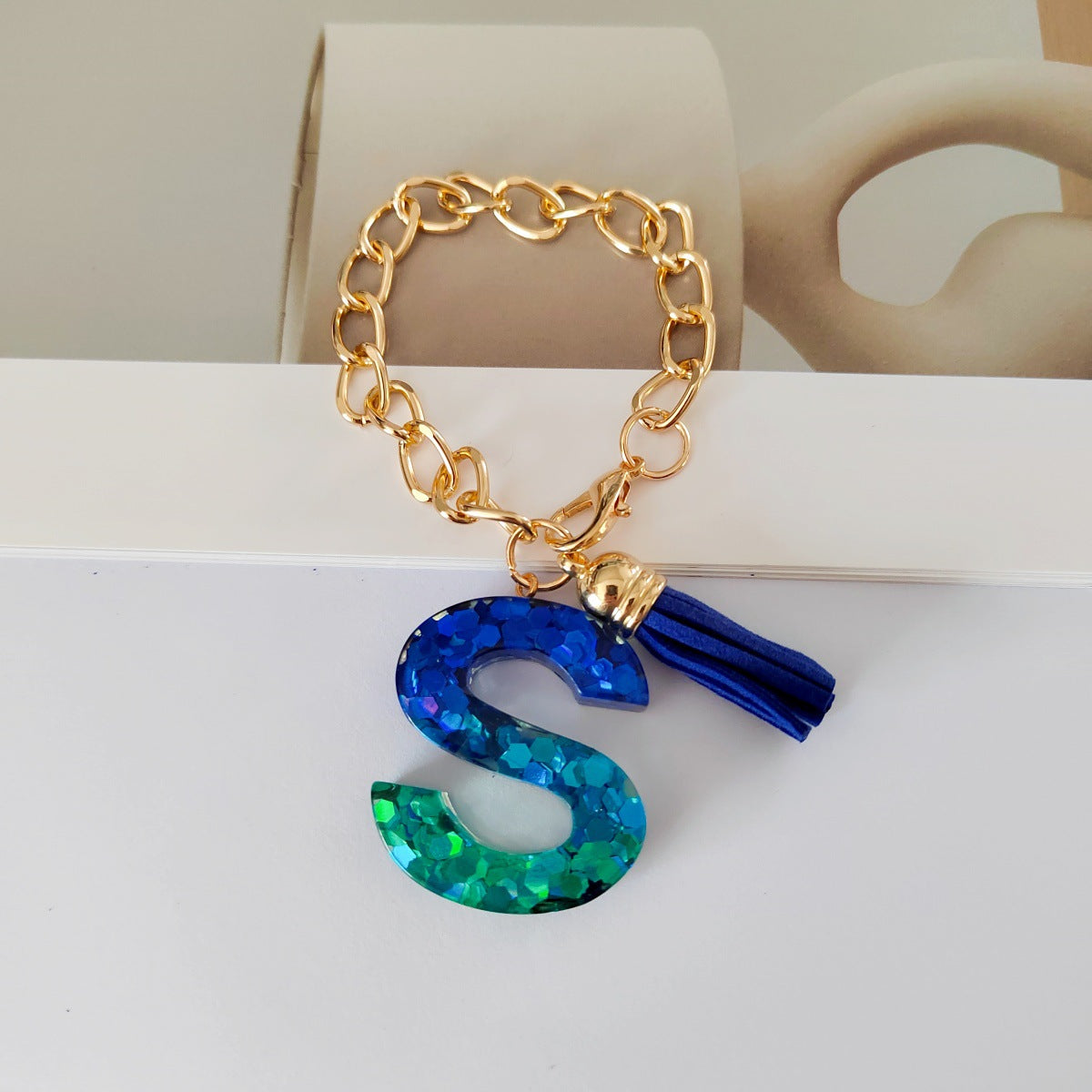 Wholesale Mixed color blue English letter keychain
