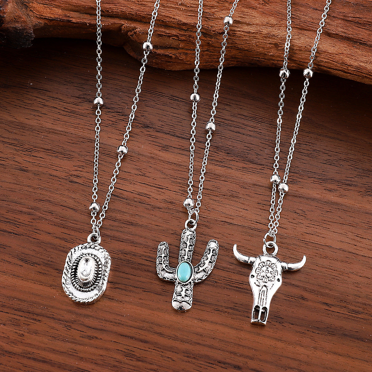 Wholesale Western Denim retro ethnic style imitation turquoise alloy cow's head war boots hat pendant necklace