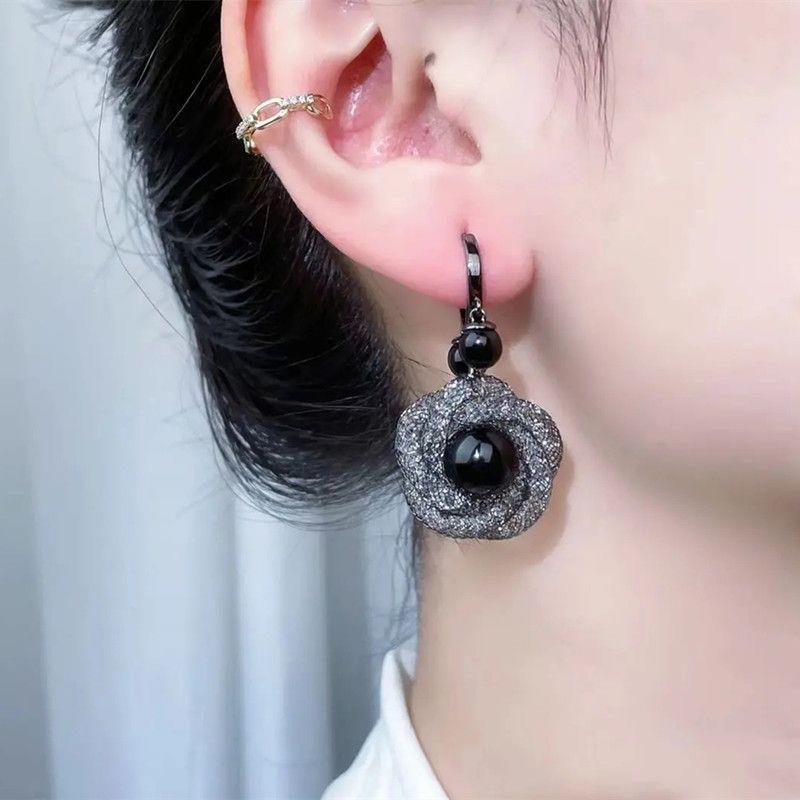 Wholesale beauty black flower  cold wind New earrings