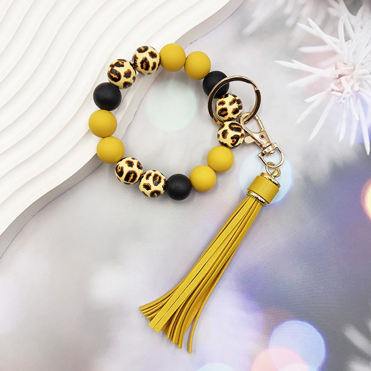 Wholesale Leopard Print Wood Beads Silicone Beaded Bracelet Tassel Key Ring