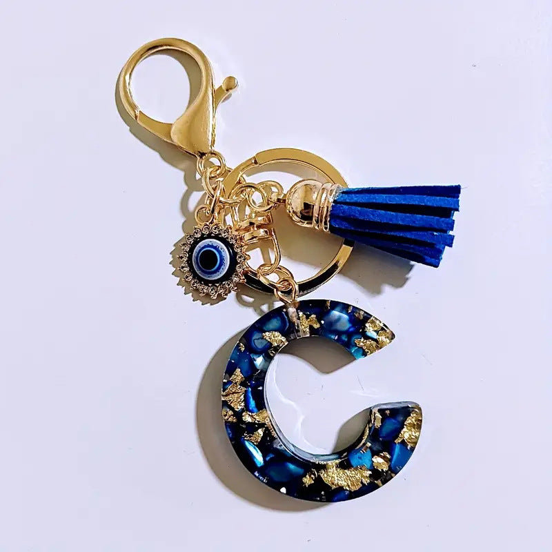 Wholesale Blue English letter Evil Eye tassel keychain