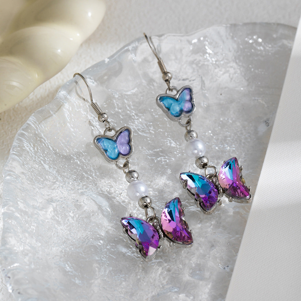 Wholesale Silver Needle Gradient Butterfly Diamond Pearl Earrings