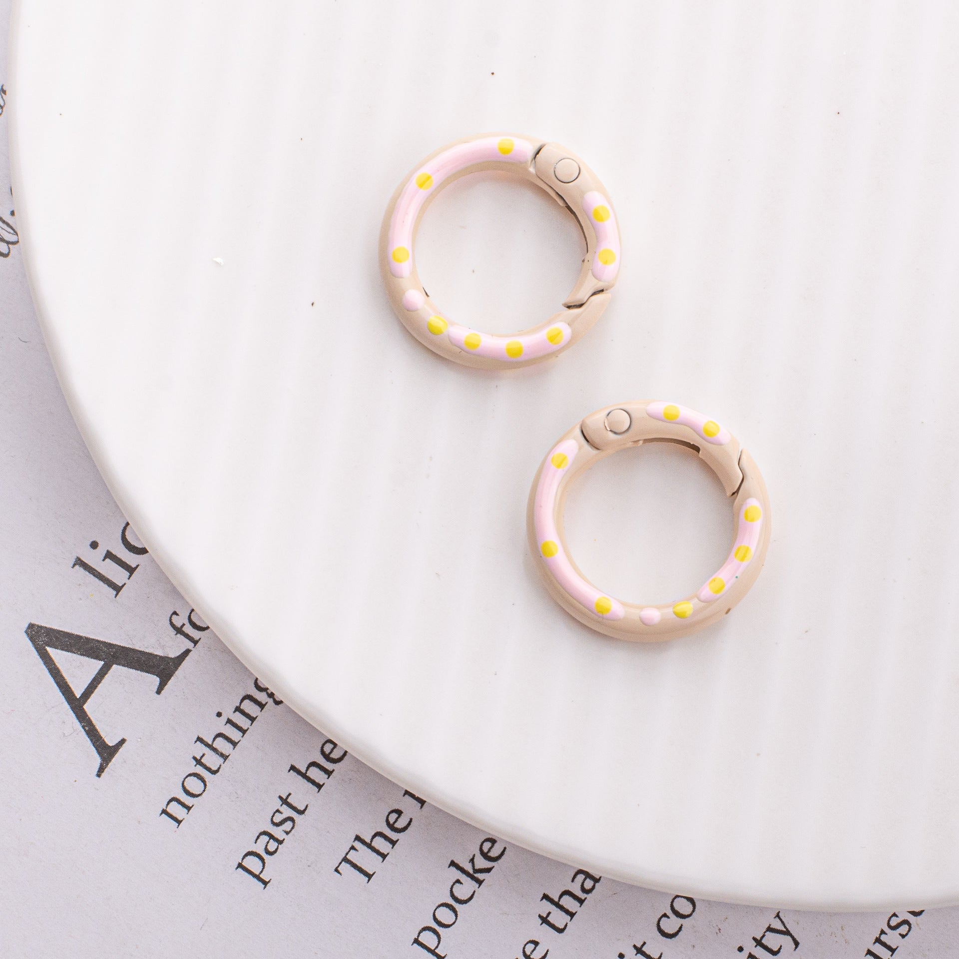 Wholesale Childlike Spring Buckle Double-sided Paint Hand-painted Colorful Polka Dot Round Alloy Keychain