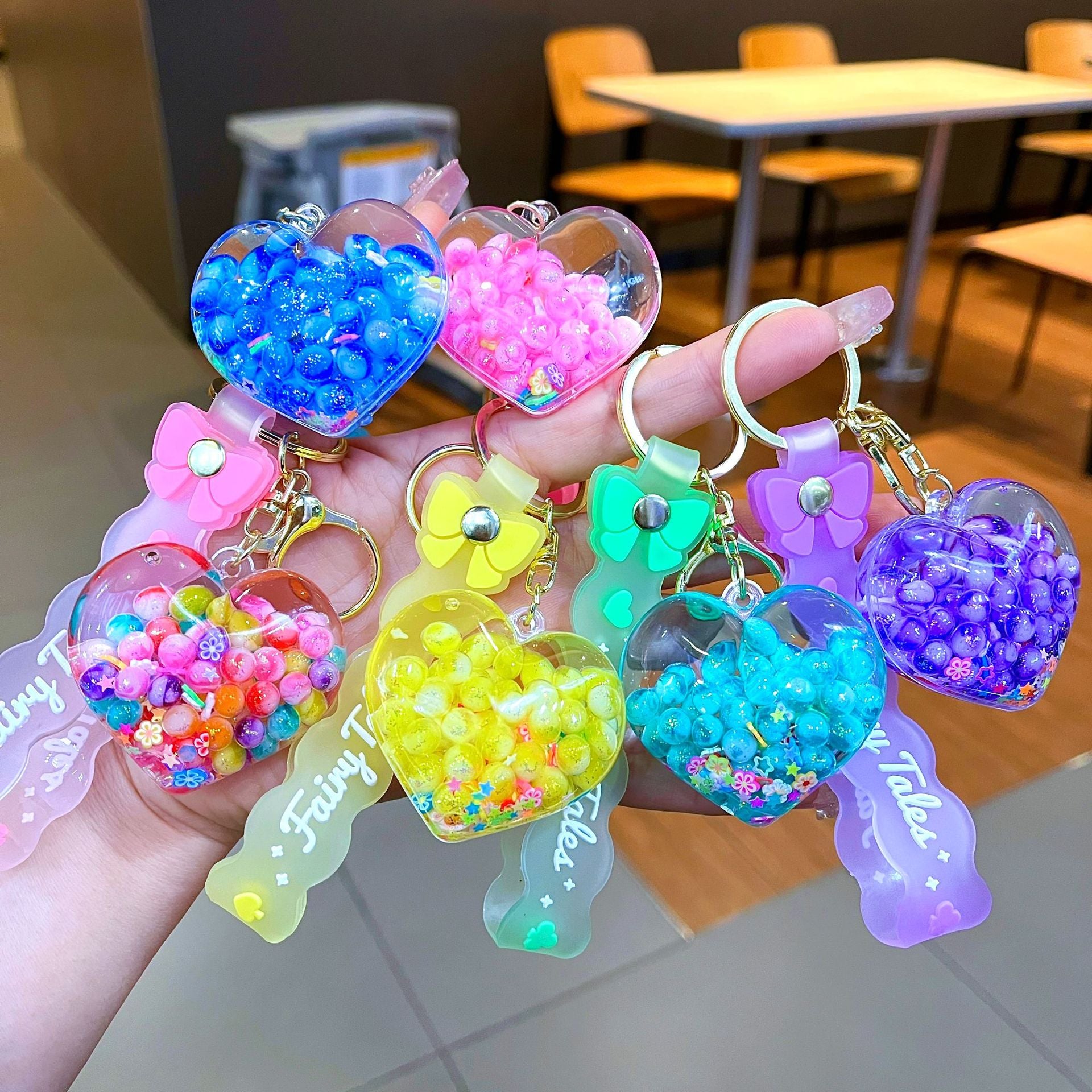 Wholesale Creative Summer Colorful Sand Heart Glow-in-the-Dark Keychain