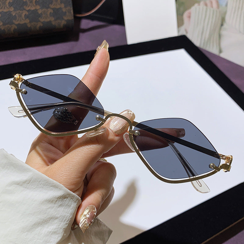Wholesale Fashion half frame diamond sunglasses metal high-end sense 2025 new small frame modern trend catwalk European and American sunglasses