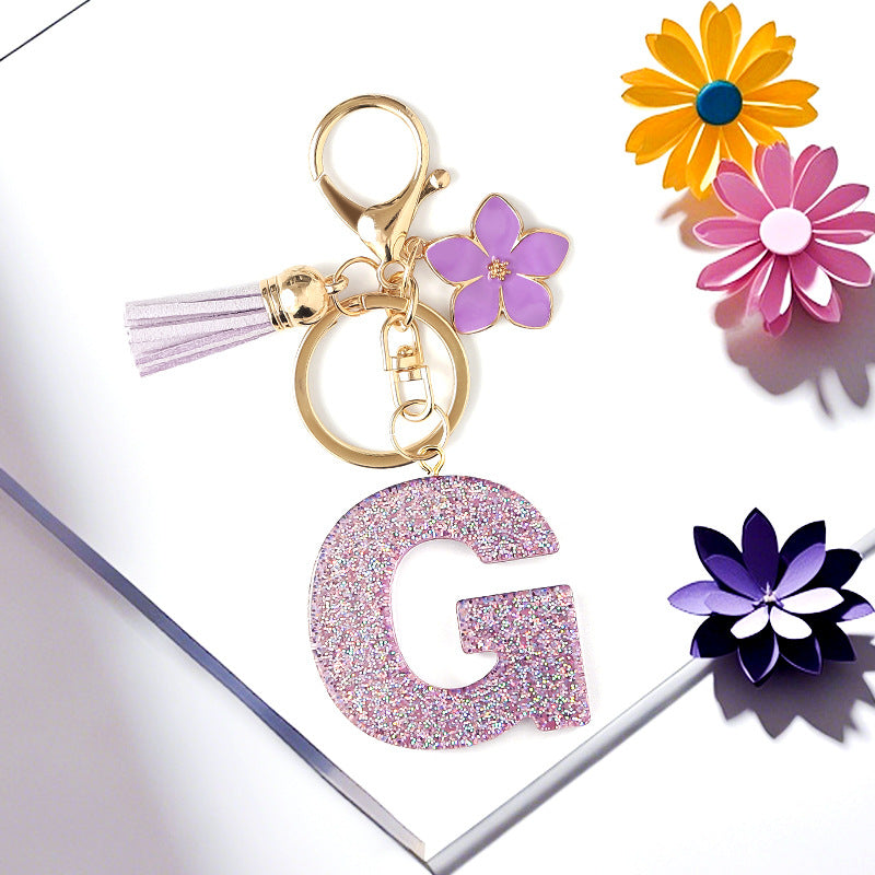 Wholesale Sparkling Pink 26 English Letter Purple Flower Keychain