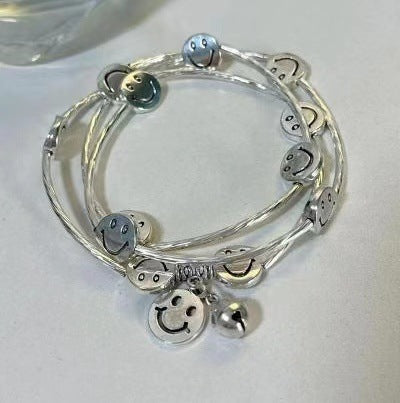 Wholesale Multi-Layered Triple Circle Bell Smiley Alloy Bracelet