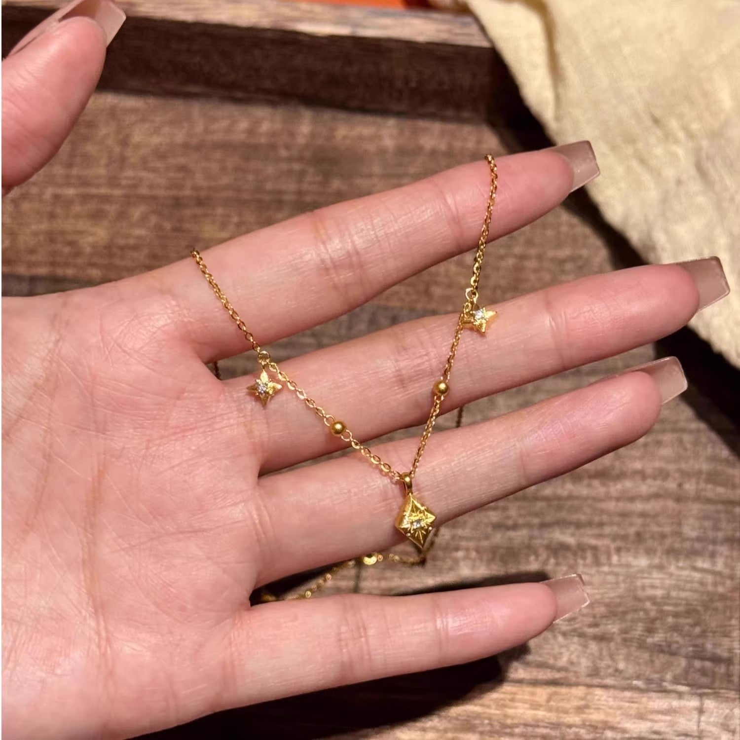 Wholesale Diamond studded necklace with diamond stars and hexagonal pointed stars