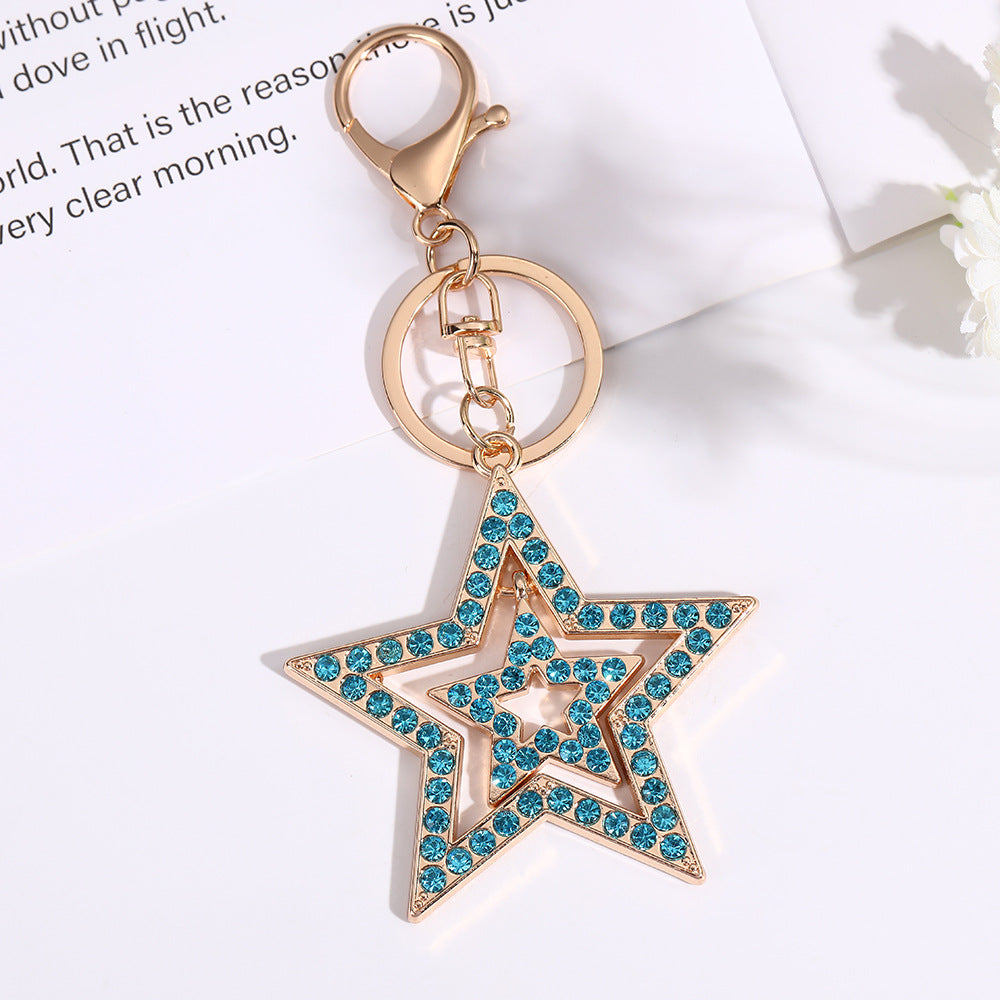 Wholesale Five pointed star hollow diamond inlaid metal keychain