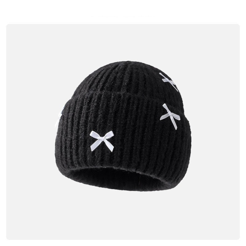 Wholesale Sweet woolen hat with bow for autumn and winter
