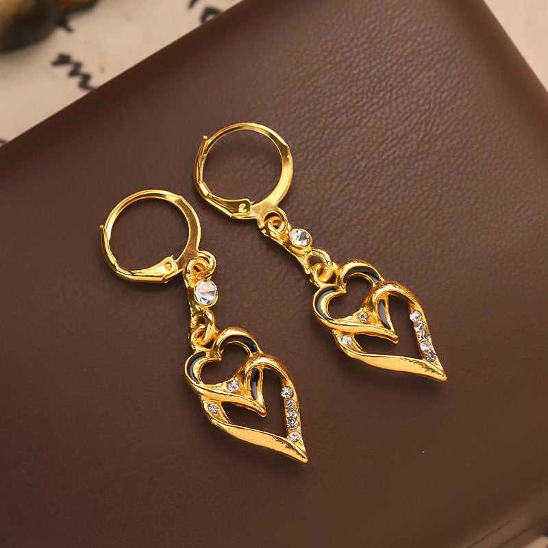 Wholesale Retro geometric hollow double heart tassel earrings
