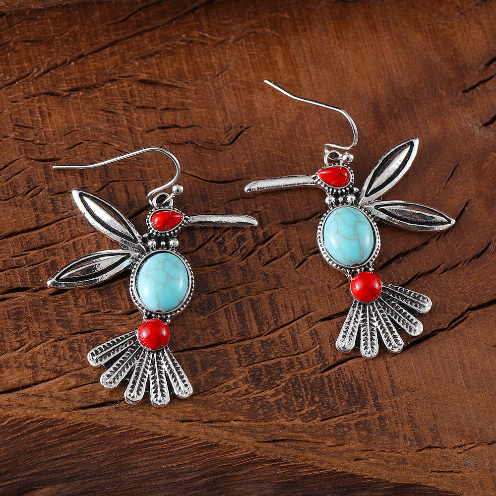 Wholesale Retro fashion inlaid turquoise bird pendant earrings