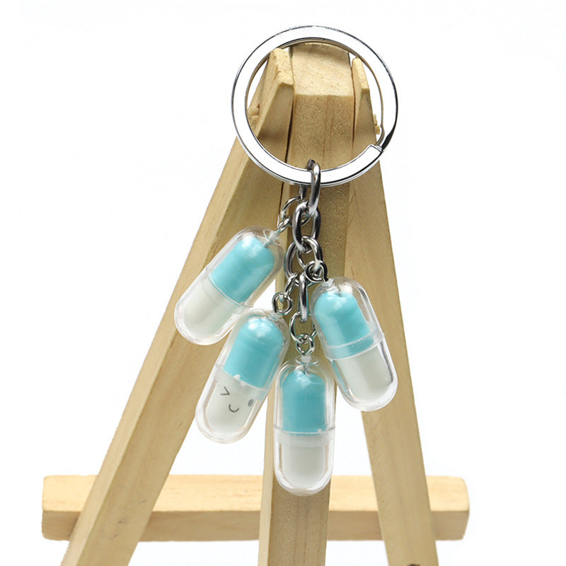 Wholesale Acrylic Cute Smiley Face Capsule Pendant Keychain