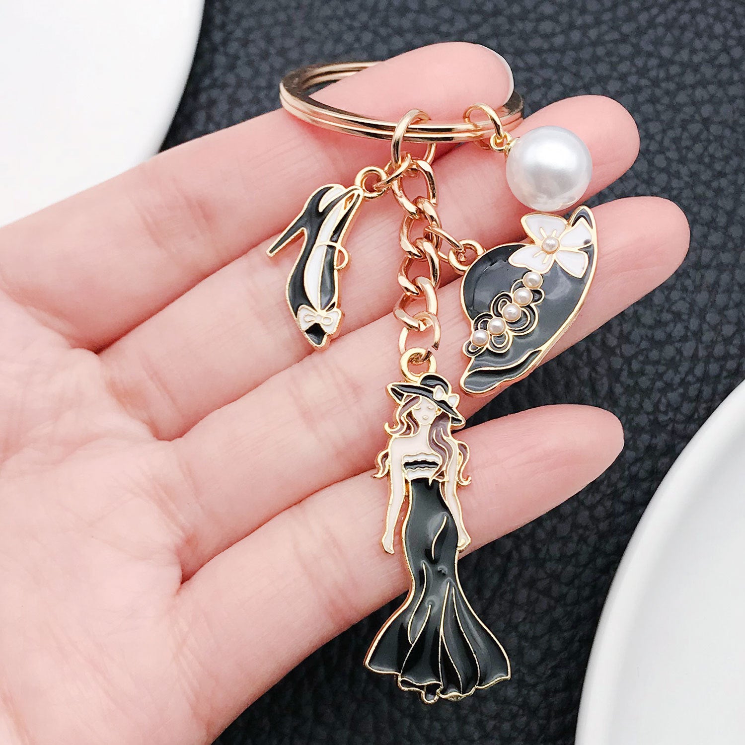 Wholesale Black red and white dress character hat high heels pearl Metal Keychain