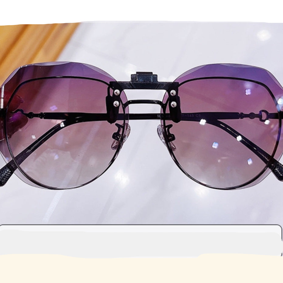 Wholesale Flip-up frameless round UV-proof sunglasses