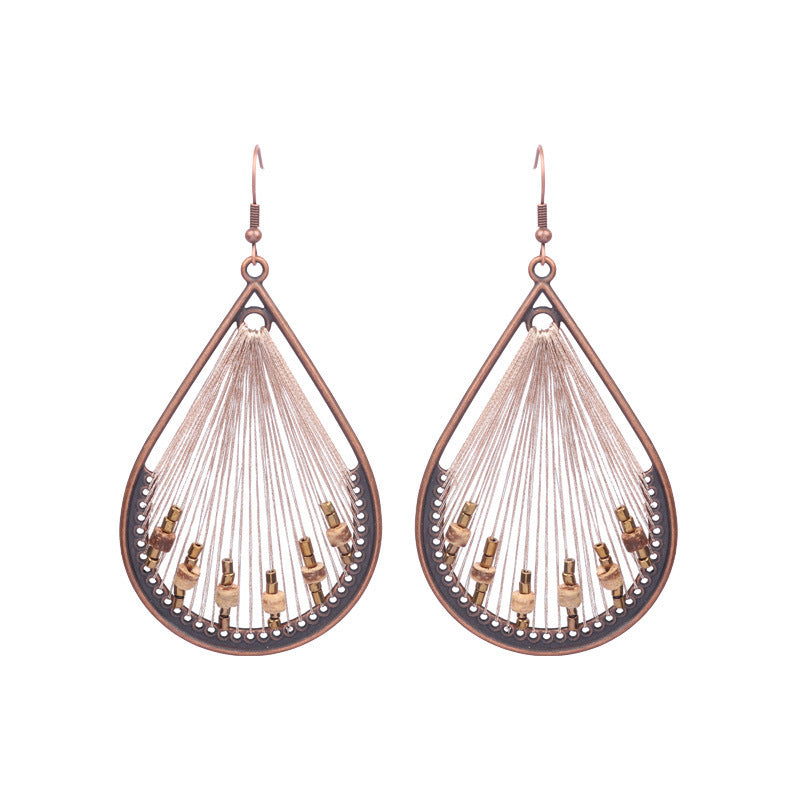 Wholesale Bohemian Rice Pearl Shell Long Tassel Earrings