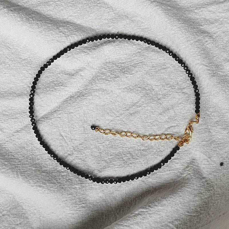 Collares de cristal sintéticos de vidrio negro al por mayor