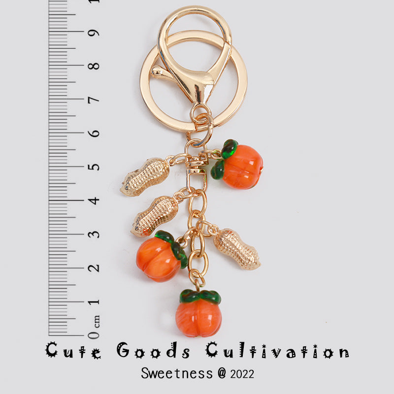 Wholesale Persimmon Keychain Good Things Happen Persimmon Ruyi Sansheng III Bag Exquisite Hanging Accessories Mobile Phone Rope Earphone Box