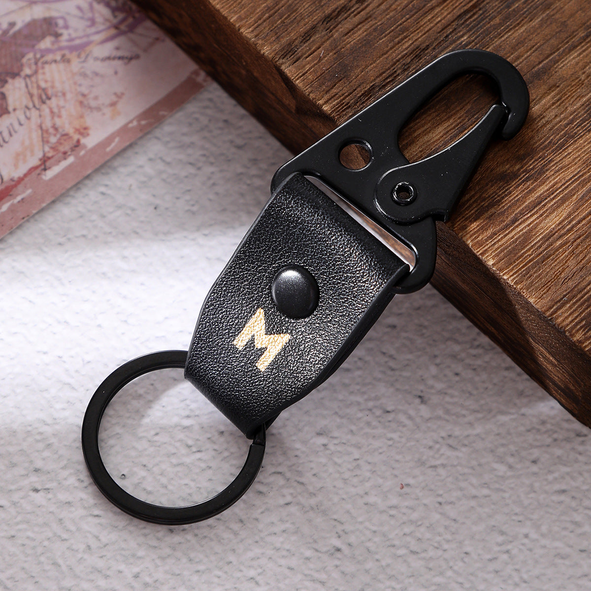 Wholesale Retro Cow Pattern Leather Letter M Alloy Keychain