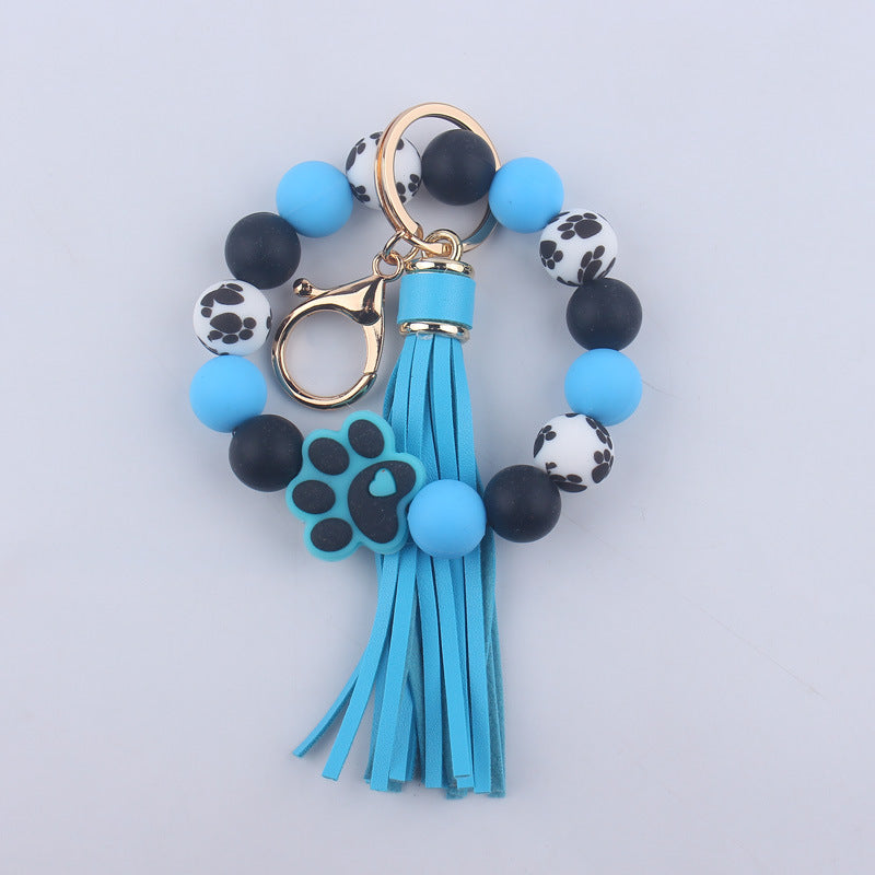 Wholesale Chic Silicone Bead Dog Paw Bracelet Keychain With Leather Tassel Fashion Gift For Resale