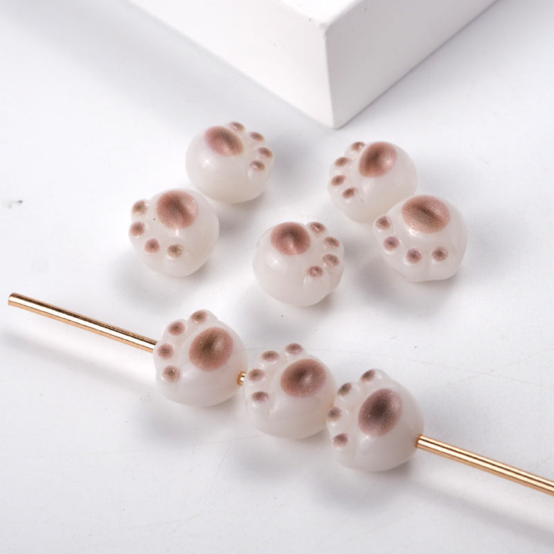 Wholesale 100PCS/PACK Cartoon Cute Three-dimensional Cat Claw Straight Hole Acrylic String Beads