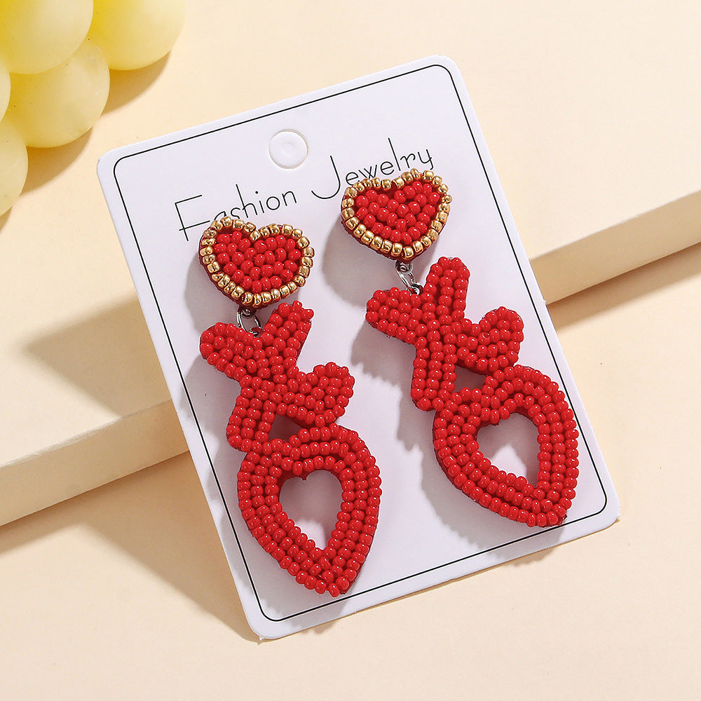 Wholesale  fashion temperament handmade three heart rice beads irregular earrings earrings Valentine's Day
