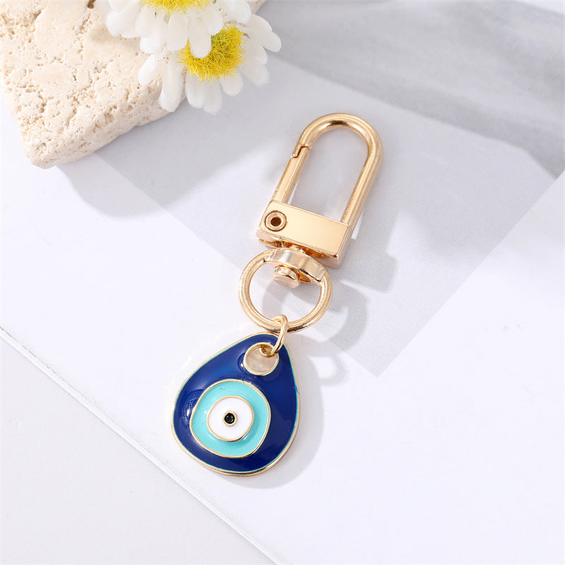Wholesale Diamond Drop Oil Heart Blue Eyes Keychains