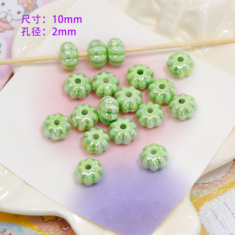 Al por mayor 30 piezas de cerámica verde fresca Cerámica encantadora Butterfly Heart Beads