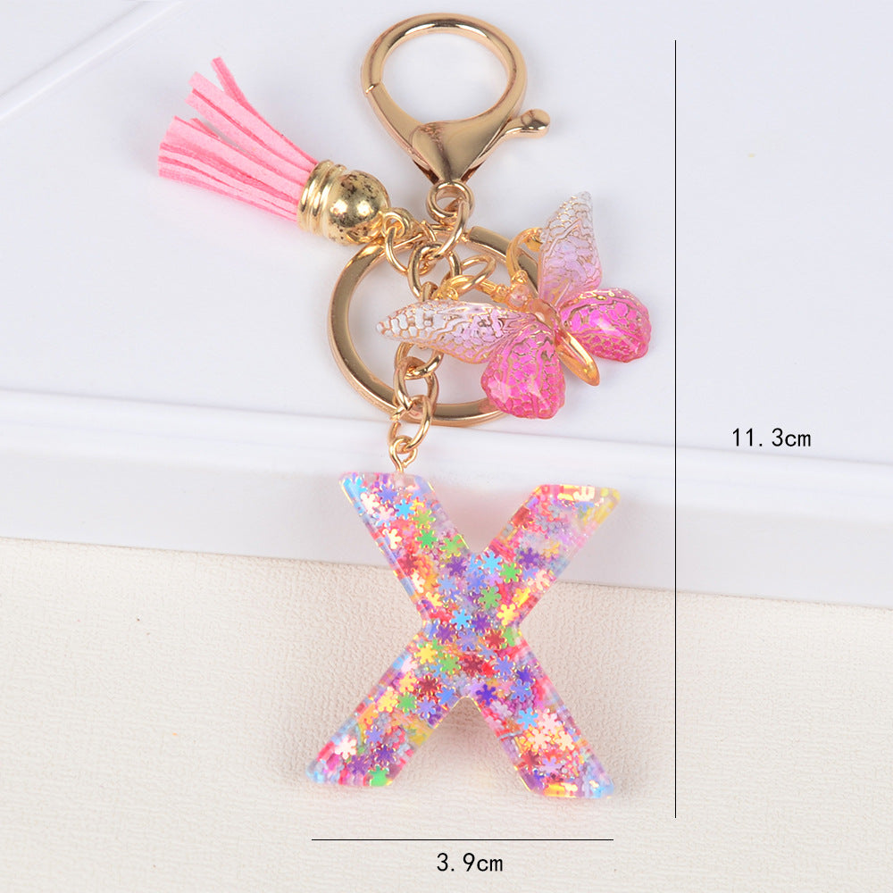 卸売スパンコールスノーフレークレター樹脂キーホルダー