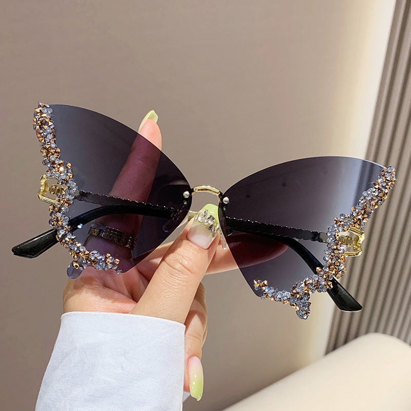 Wholesale Butterfly Shaped Diamond Inlaid Frameless PC Sunglasses